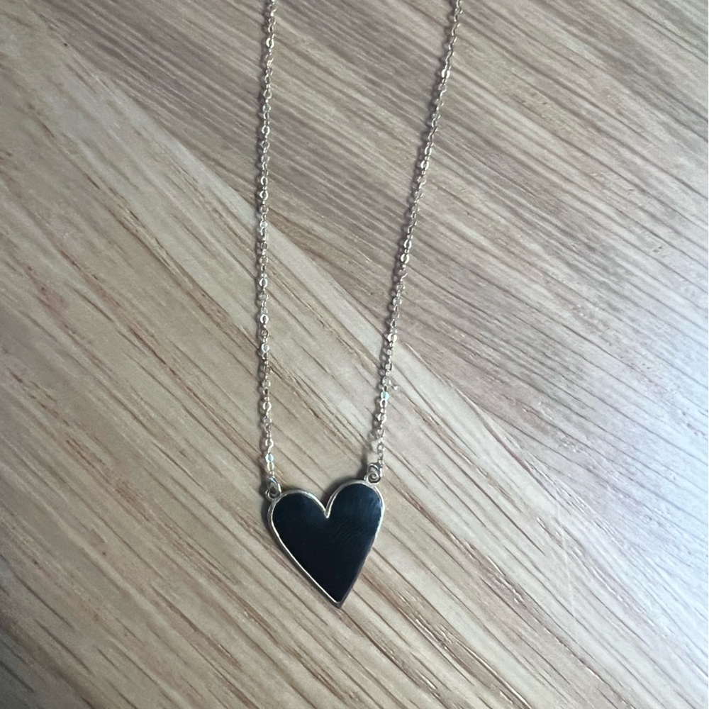 Solid 14k gold heart necklace.